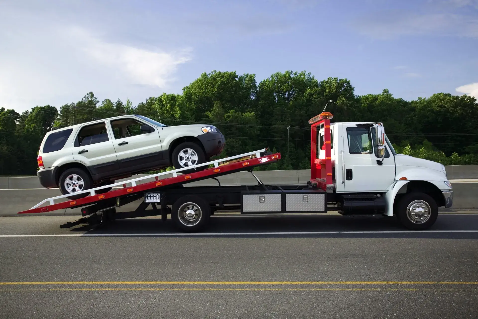 How Flatbed Towing Remarkably Protects Your Car’s Value?